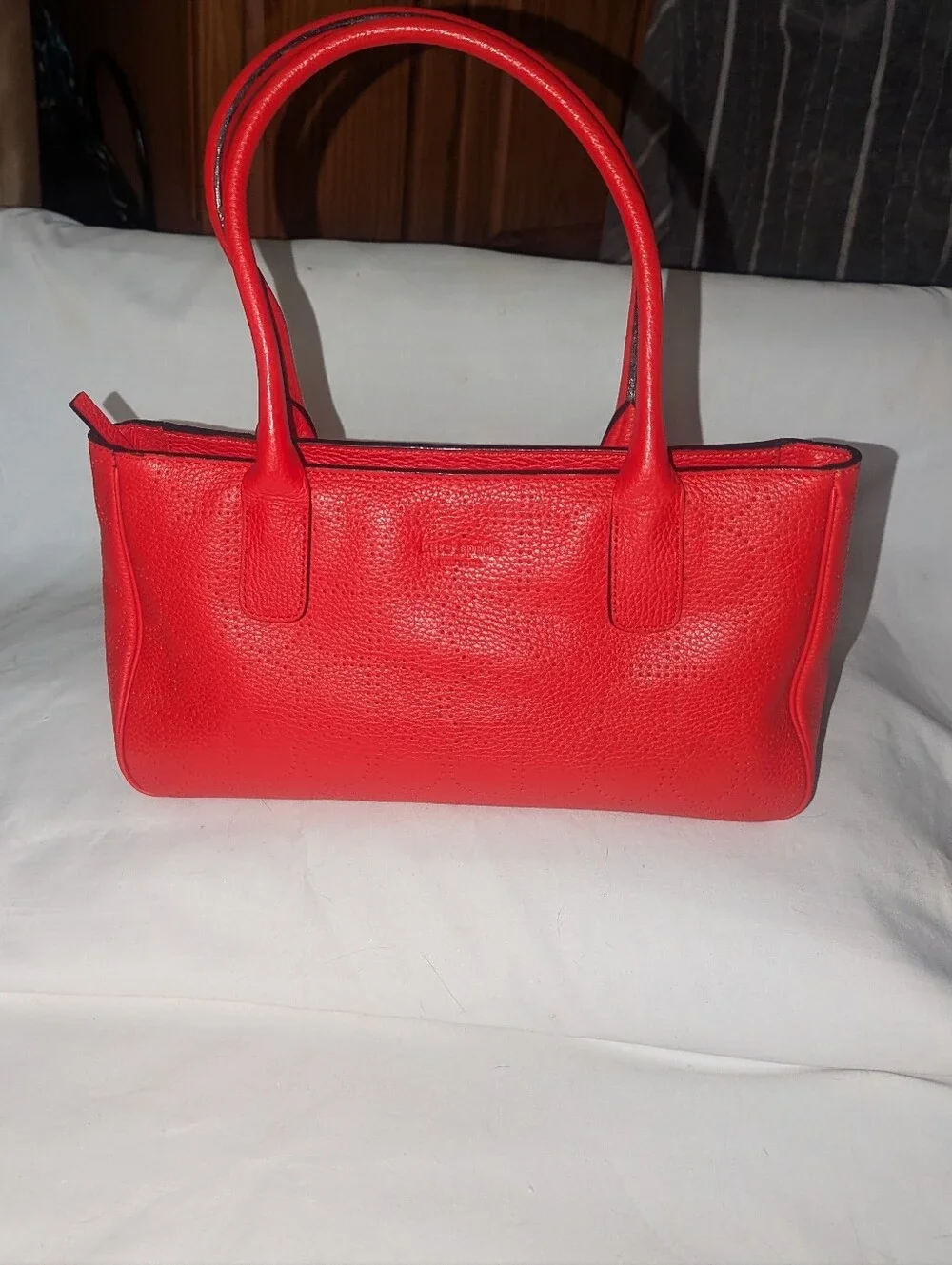 Kate Spade New York  Noel Rue Red Pebbled Perforated Leather Tote Bag.